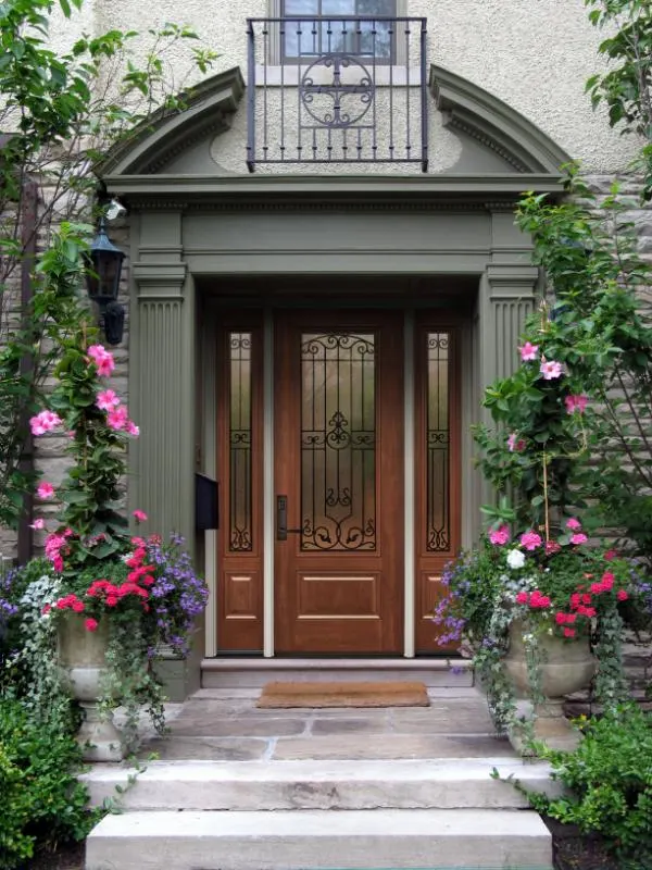 Entry door with decorative glass and sidelites