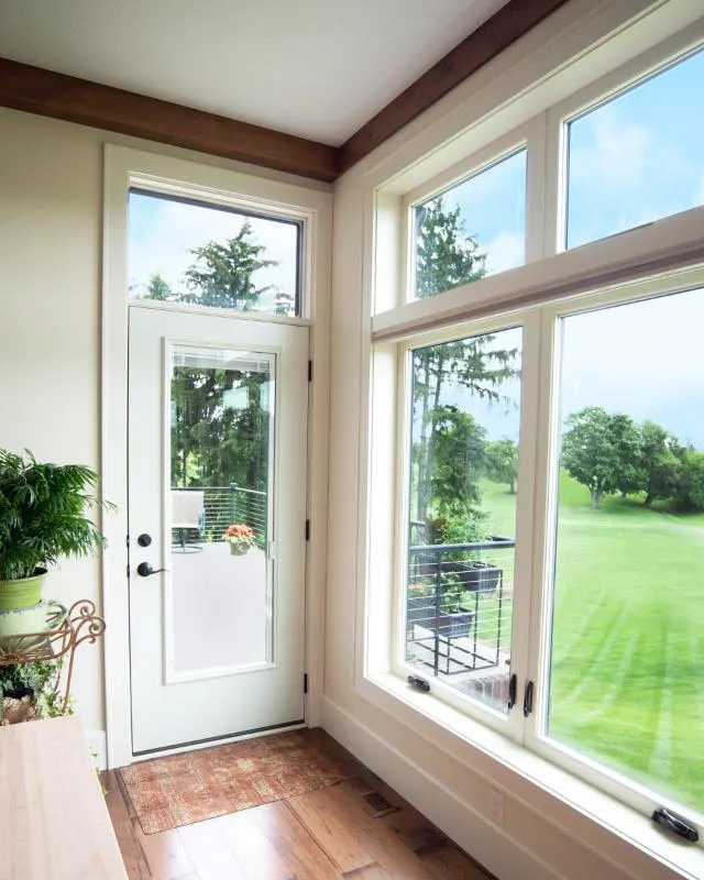 Glass doors and windows connecting indoor and outdoor spaces